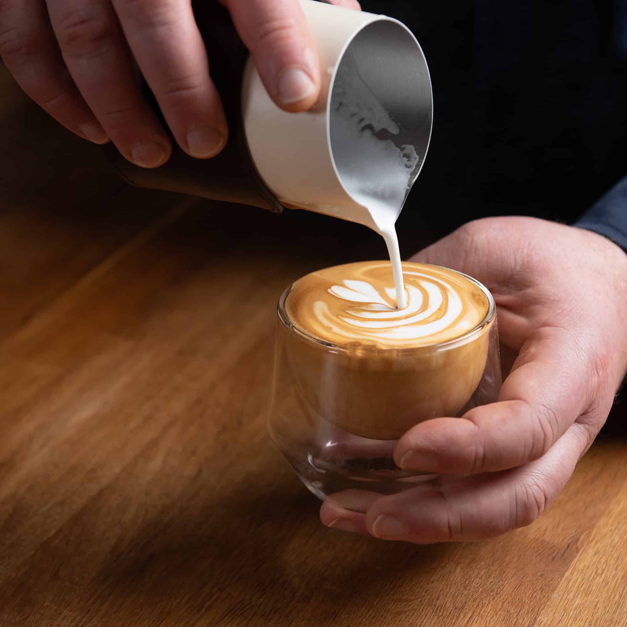 Barista creating latte art